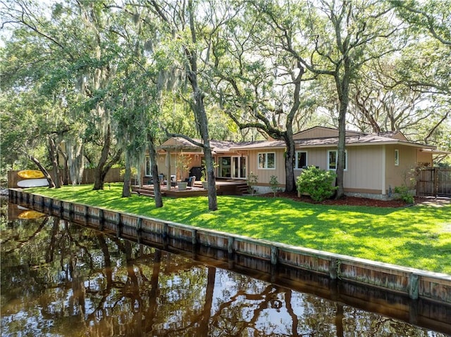 105 Driftwood Pl, Saint Simons Island, GA 31522 - rear view of house featuring a deck with water view