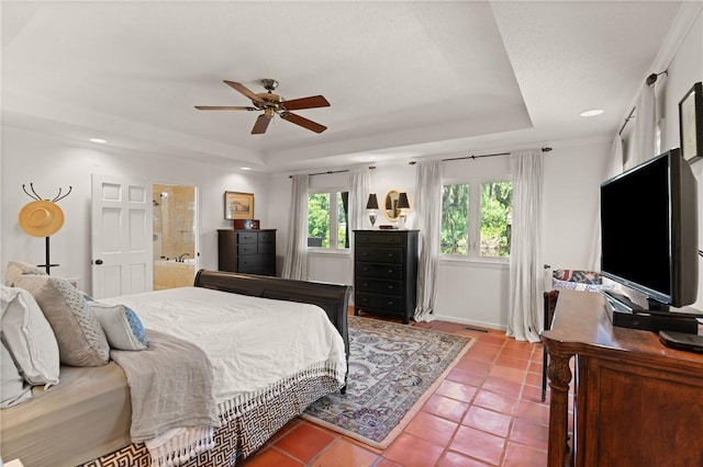 105 Driftwood Pl, Saint Simons Island, GA 31522 - bedroom featuring a raised ceiling, light tile patterned floors, ceiling fan, and recessed lighting