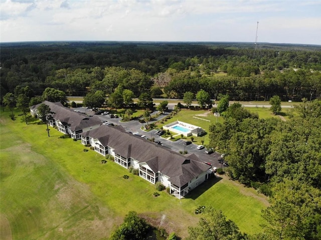 drone / aerial view with a view of trees