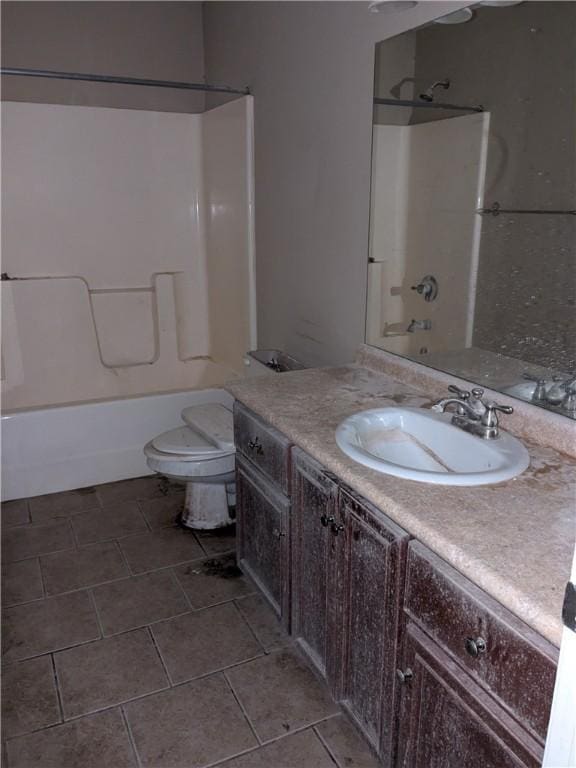 full bathroom with vanity,  shower combination, and toilet