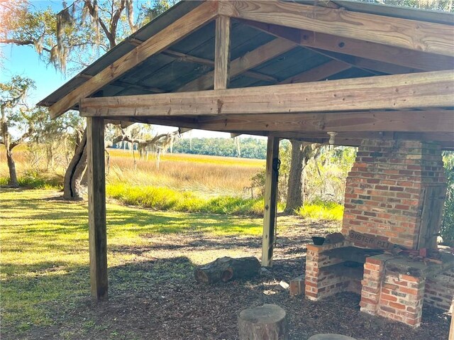 view of yard with a gazebo and a rural view