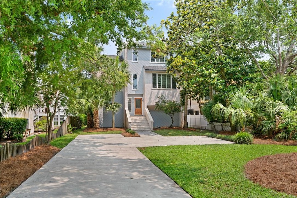 1604 Bruce Dr, Saint Simons Island, GA 31522 - view of front of property with stucco siding