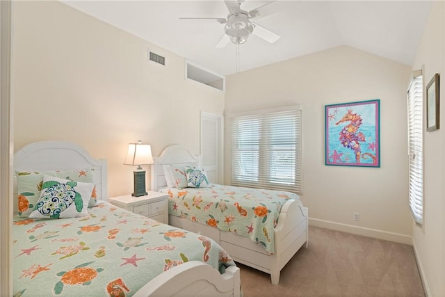 630 Sheraton Plz, Saint Simons Island, GA 31522 - bedroom featuring light carpet, lofted ceiling, and ceiling fan