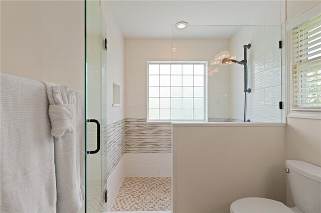 630 Sheraton Plz, Saint Simons Island, GA 31522 - full bathroom featuring a shower stall and toilet
