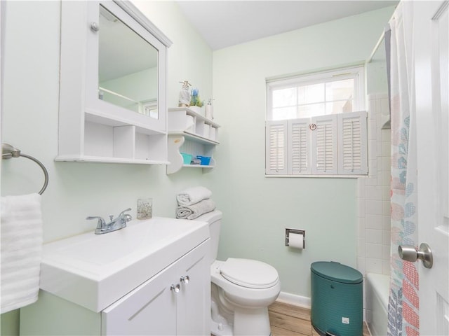 full bathroom with wood-type flooring, vanity, toilet, and shower / bath combo