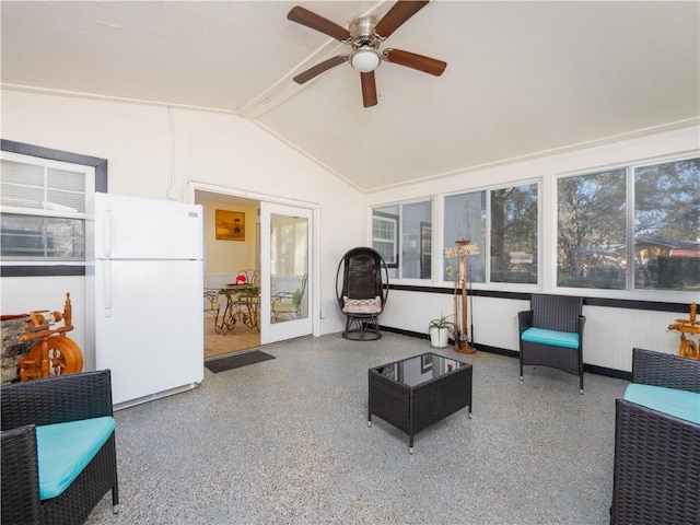 sunroom with ceiling fan, lofted ceiling, and radiator heating unit