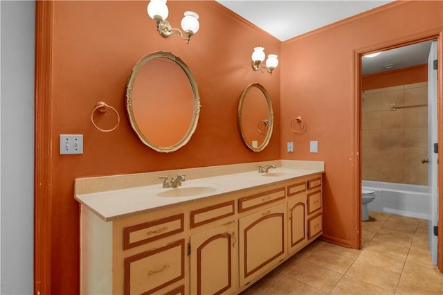 208 Plantation Dr, Waycross, GA 31501 - bathroom featuring double vanity, toilet, a sink, and tile patterned flooring