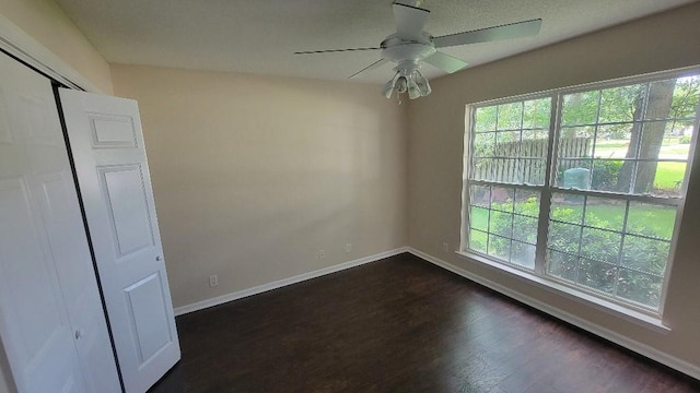 102 Norwood Ct, Brunswick, GA 31525 - unfurnished room featuring healthy amount of natural light, dark wood-style floors, and ceiling fan