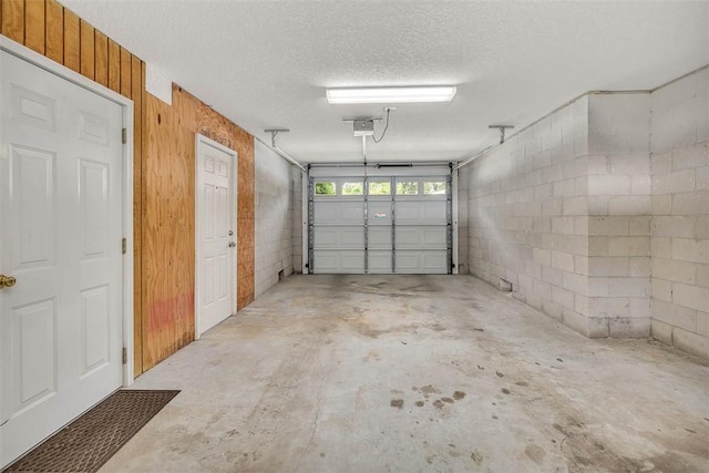 200 Colgana Way, Saint Simons Island, GA 31522 - garage with a garage door opener and concrete block wall