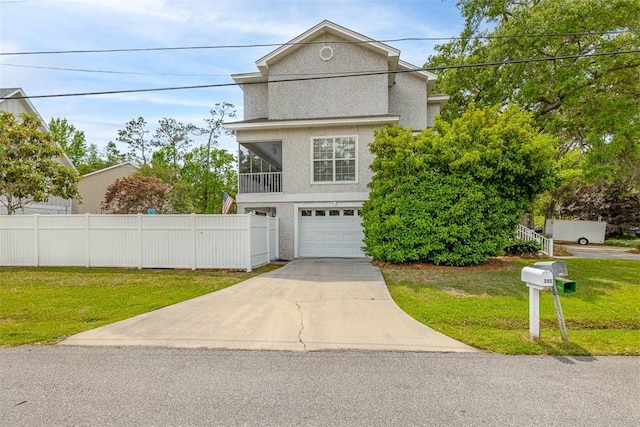200 Colgana Way, Saint Simons Island, GA 31522 - view of front facade with driveway, an attached garage, a balcony, and stucco siding