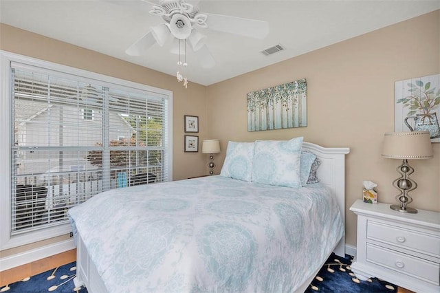 200 Colgana Way, Saint Simons Island, GA 31522 - bedroom with a ceiling fan and wood finished floors
