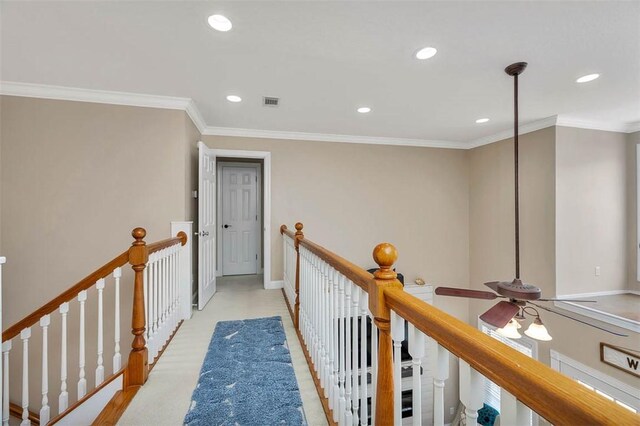 200 Colgana Way, Saint Simons Island, GA 31522 - hall featuring an upstairs landing, recessed lighting, crown molding, and carpet flooring