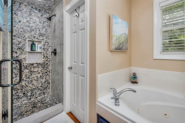 200 Colgana Way, Saint Simons Island, GA 31522 - bathroom with healthy amount of natural light, a jetted tub, and a shower stall