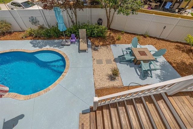 200 Colgana Way, Saint Simons Island, GA 31522 - view of pool with an outdoor fire pit, a fenced backyard, and a patio