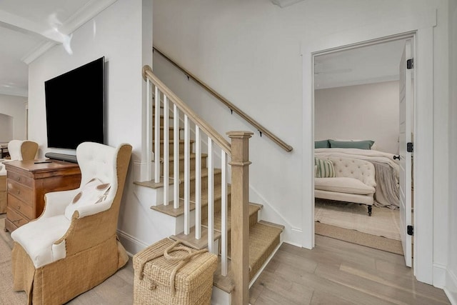 stairway featuring hardwood / wood-style flooring