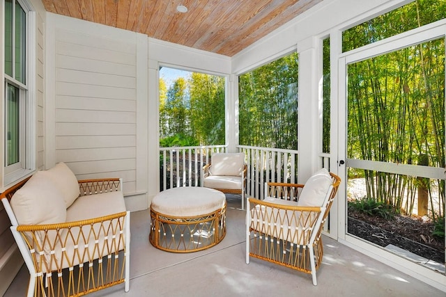 sunroom / solarium with wood ceiling and plenty of natural light