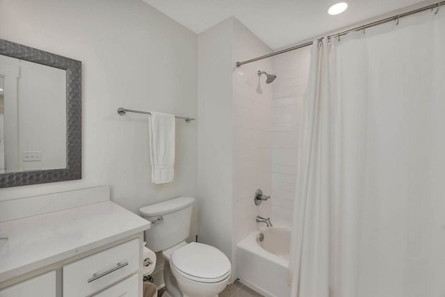 full bathroom featuring shower / bath combination with curtain, vanity, and toilet