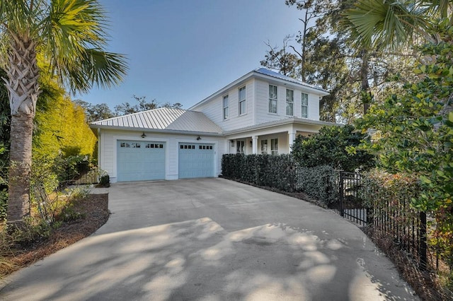 view of front of property featuring a garage