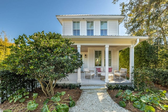 view of front of home with an outdoor living space