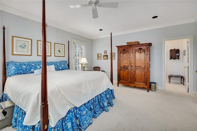 bedroom with crown molding, ceiling fan, and light colored carpet