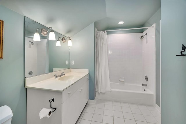 full bathroom featuring vanity, shower / tub combo with curtain, tile patterned floors, and toilet