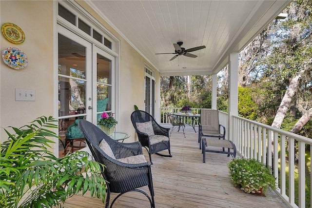 wooden deck with ceiling fan