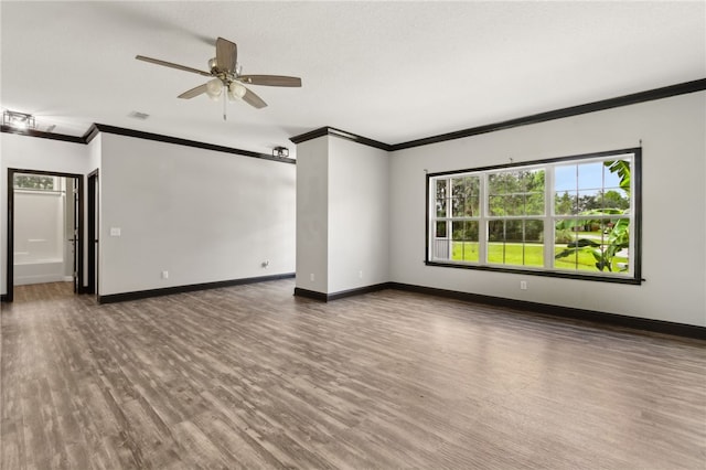 18 Ace Cir, Brunswick, GA 31523 - spare room with ornamental molding, wood finished floors, and ceiling fan