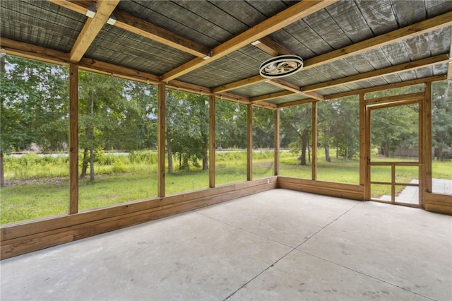 18 Ace Cir, Brunswick, GA 31523 - unfurnished sunroom with view of wooded area