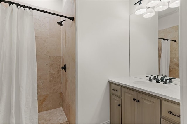 bathroom featuring vanity and curtained shower