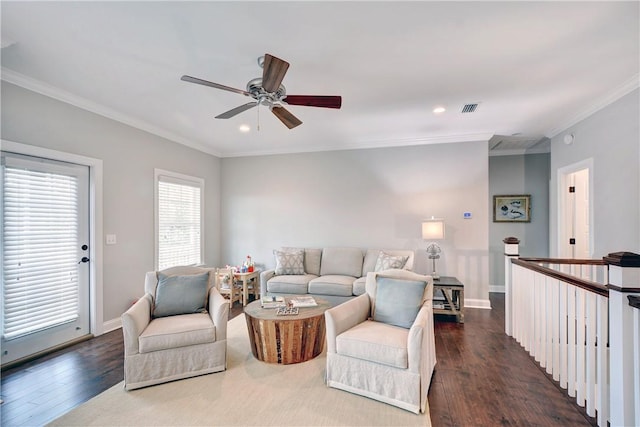 living room featuring ceiling fan, dark hardwood / wood-style flooring, and crown molding