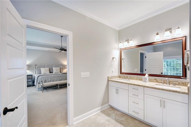 bathroom with vanity, ceiling fan, and crown molding