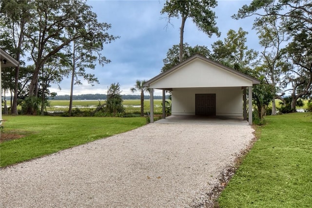 exterior space featuring a rural view and a lawn