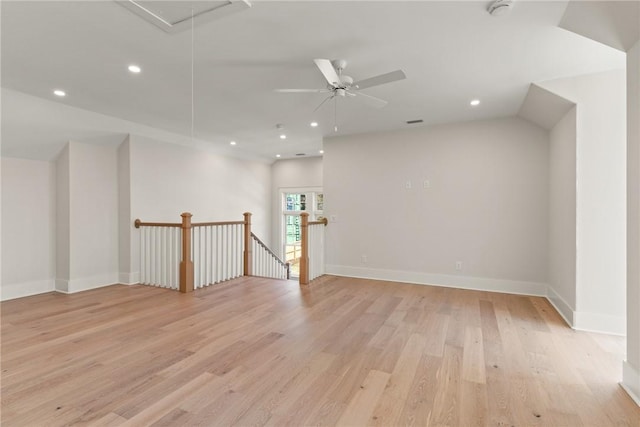 empty room with light hardwood / wood-style flooring and ceiling fan