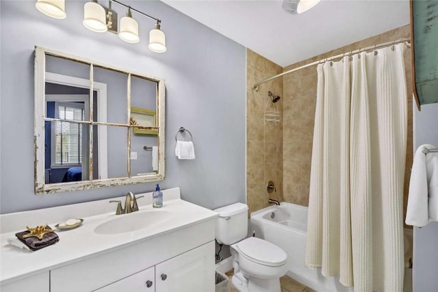 full bathroom featuring vanity, shower / bathtub combination with curtain, and toilet