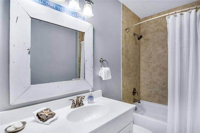 full bathroom featuring vanity, toilet, and shower / tub combo with curtain