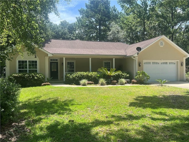 134 Hillery Trce, Brunswick, GA 31523 - single story home featuring an attached garage, a front yard, stucco siding, and driveway