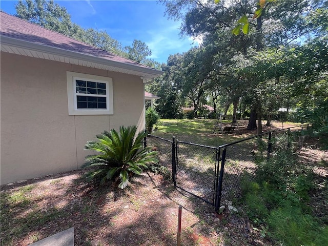134 Hillery Trce, Brunswick, GA 31523 - view of yard with a gate