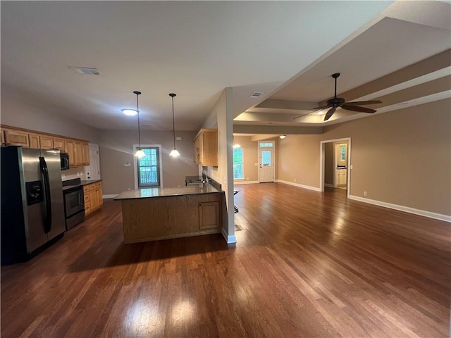 134 Hillery Trce, Brunswick, GA 31523 - kitchen featuring stainless steel refrigerator with ice dispenser, stove, open floor plan, dark wood finished floors, and a peninsula