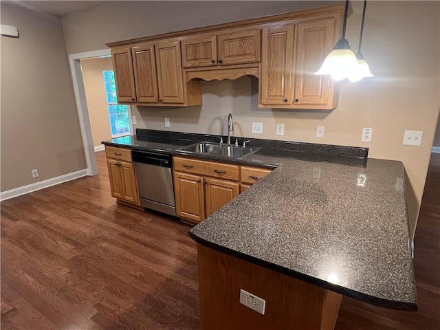 134 Hillery Trce, Brunswick, GA 31523 - kitchen with dishwasher, dark countertops, and dark wood-style floors