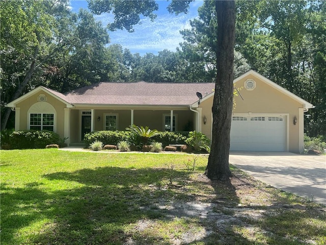 134 Hillery Trce, Brunswick, GA 31523 - ranch-style home with a garage, a front lawn, concrete driveway, and stucco siding