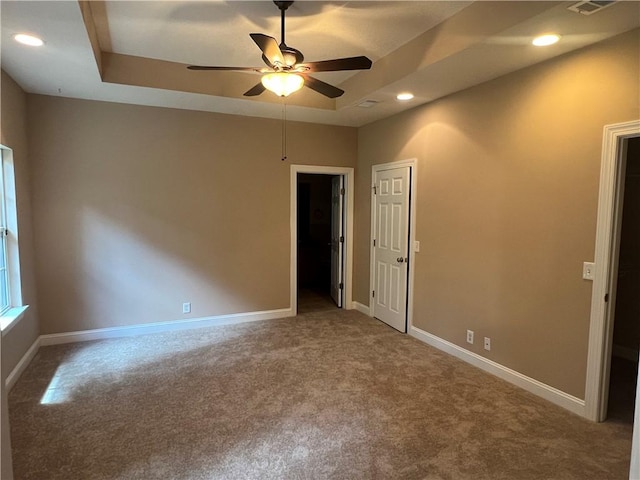 134 Hillery Trce, Brunswick, GA 31523 - carpeted spare room featuring a ceiling fan, recessed lighting, and a raised ceiling