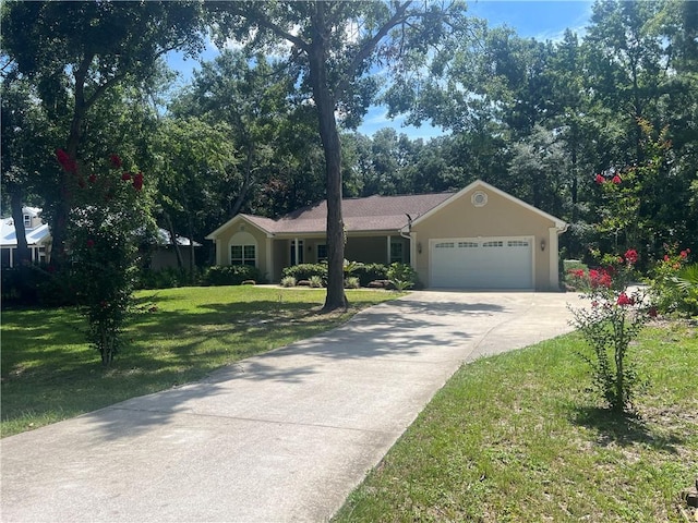 134 Hillery Trce, Brunswick, GA 31523 - ranch-style house with a front lawn, driveway, and an attached garage
