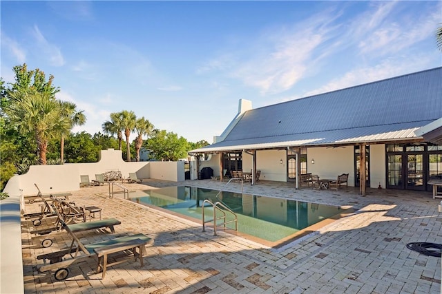 222 Bottlebrush Walk, Brunswick, GA 31525 - community pool with french doors and a patio area