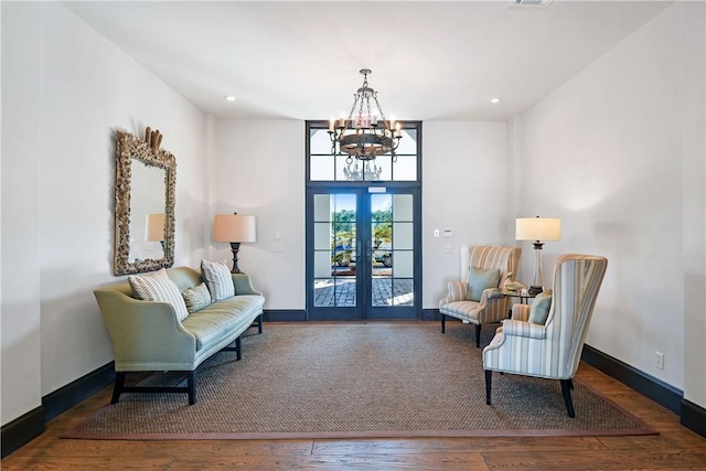 222 Bottlebrush Walk, Brunswick, GA 31525 - living area featuring a chandelier, wood finished floors, and recessed lighting