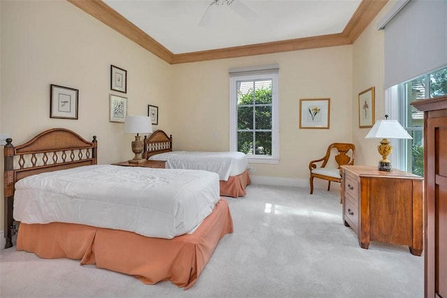 117 Hawkins Island Cir, Saint Simons Island, GA 31522 - bedroom with crown molding, light carpet, and ceiling fan