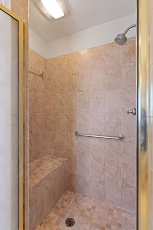 bathroom featuring walk in shower