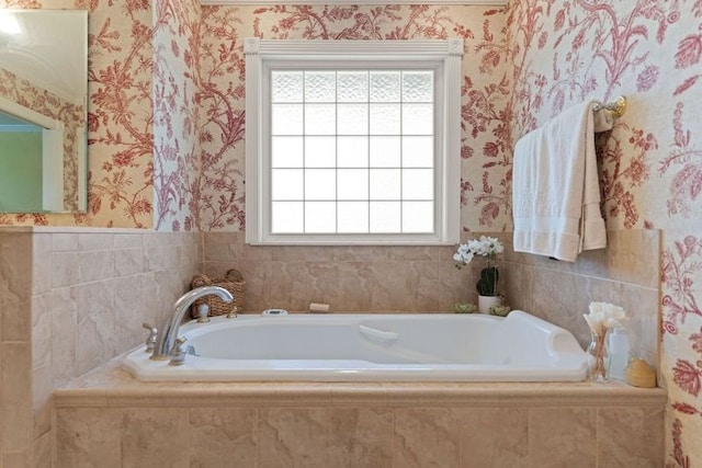 bathroom with tiled bath