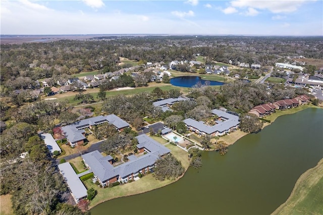 drone / aerial view with a residential view and a water view