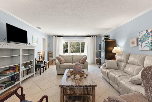 living room with crown molding, light tile patterned flooring, visible vents, and a textured ceiling