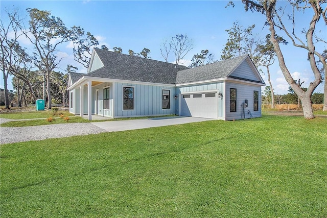 view of front of home featuring a front lawn, board and batten siding, concrete driveway, an attached garage, and roof with shingles